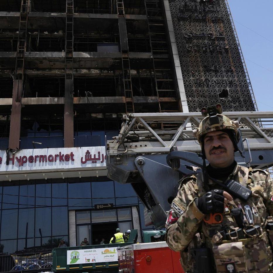 Officials try to identify 18 bodies in deadly Iraq shopping mall fire